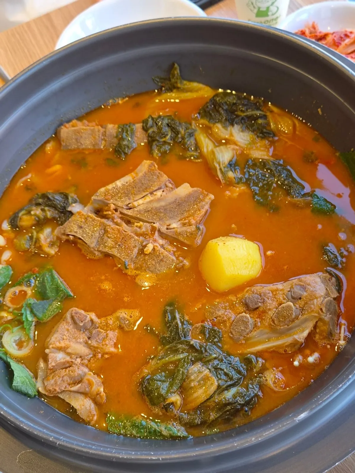 Gamjatang simmering on the table