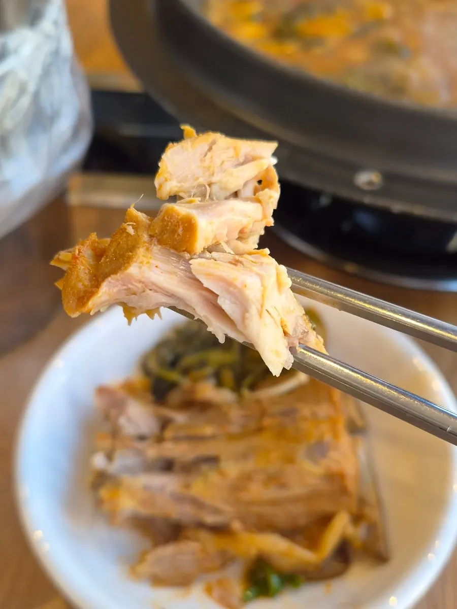 Meat falling off the bone in the gamjatang