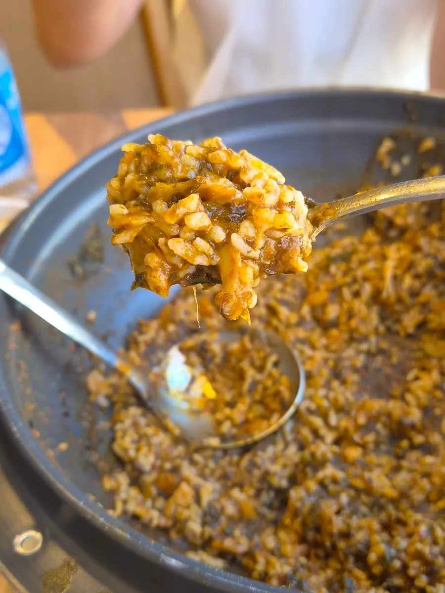 Fried rice pressed and browned against the pan