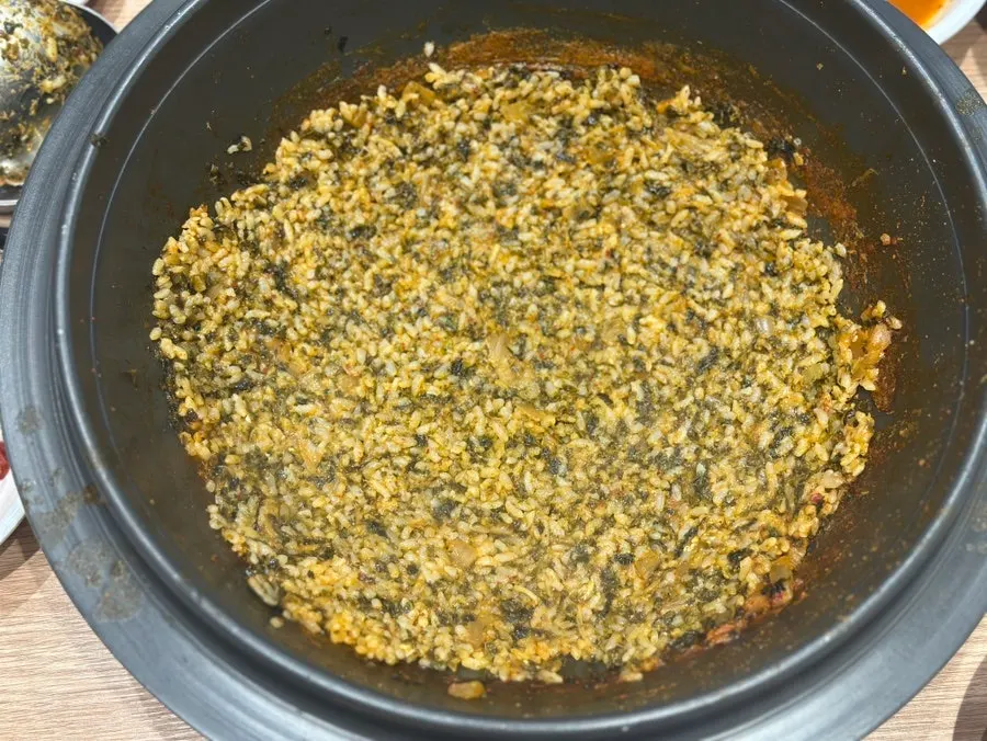 Fried rice being cooked in the pot