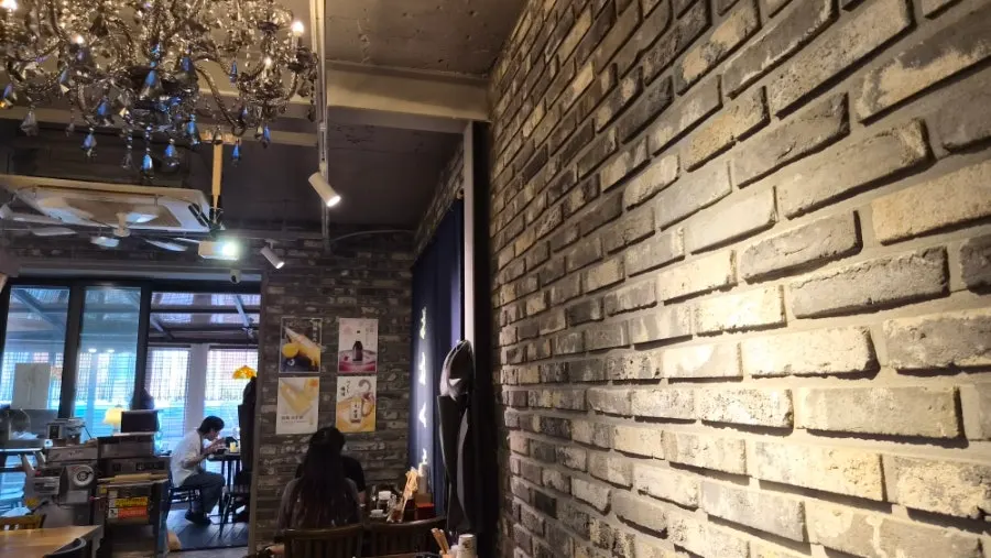 View of a table with diners enjoying their ramen