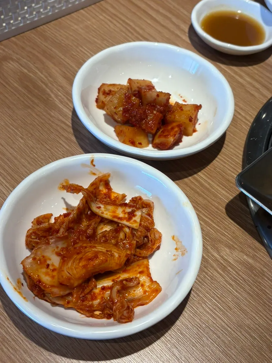 Self-serve bar with fresh kimchi and kkakdugi