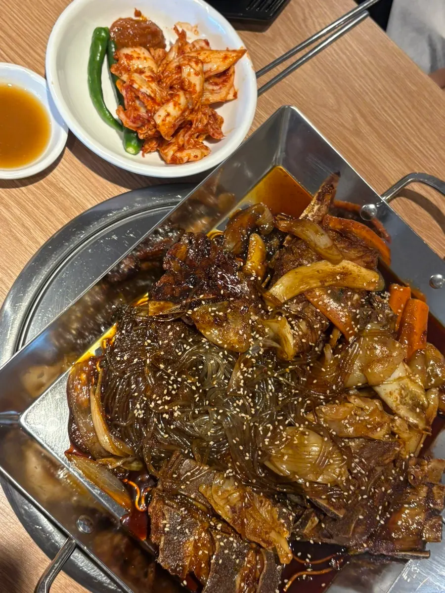 Gamjatang broth served with an order of braised bones