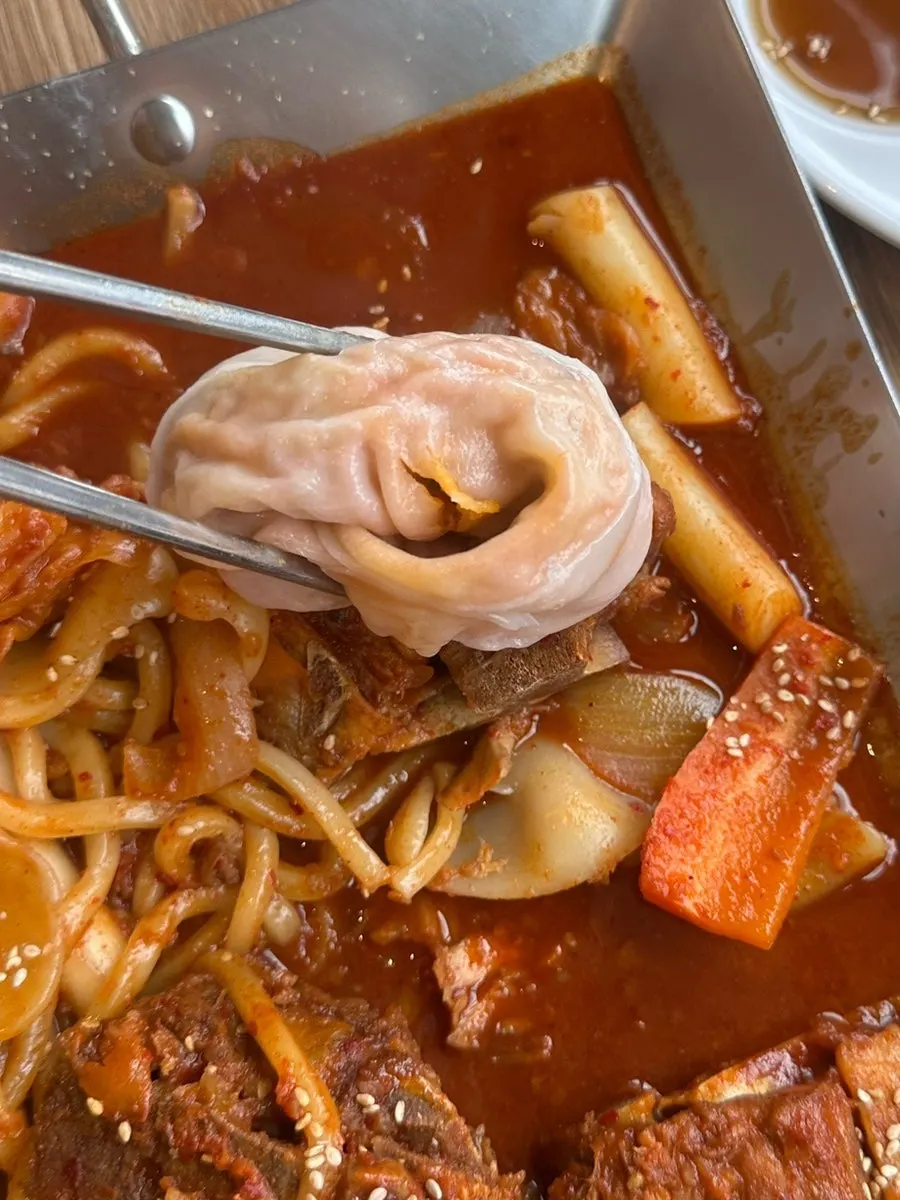 Four kimchi dumplings ordered as a side