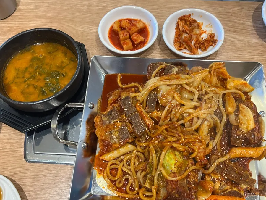 Small spicy bone stew served on the hot plate