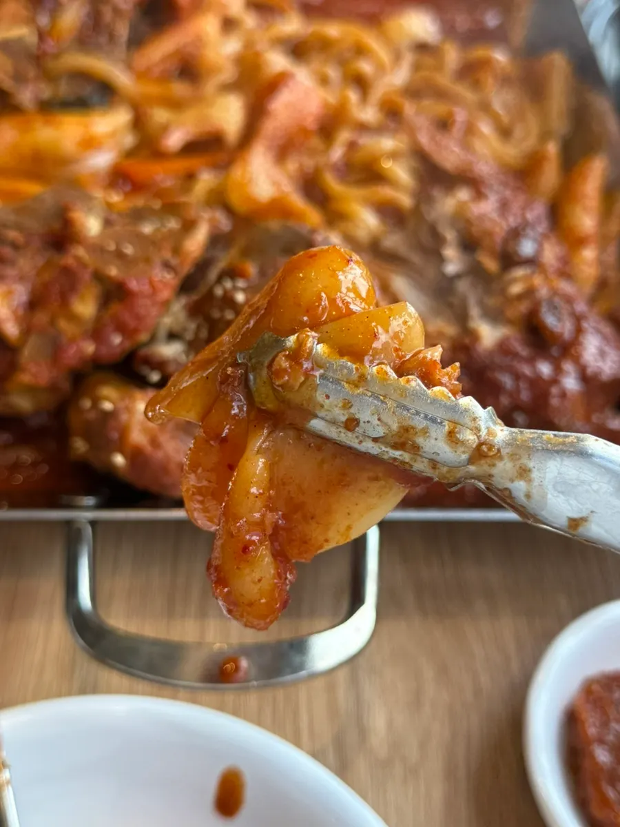 Pork bone braise with rice cakes and sujebi