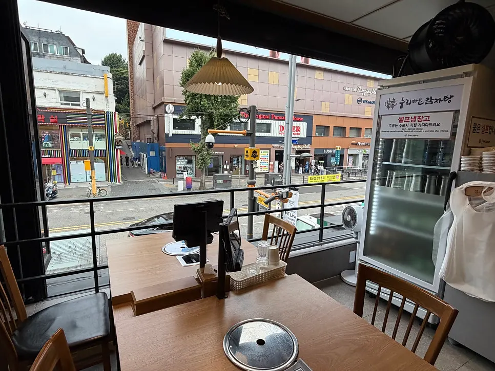 Open-air patio-style outdoor tables on the 2nd floor