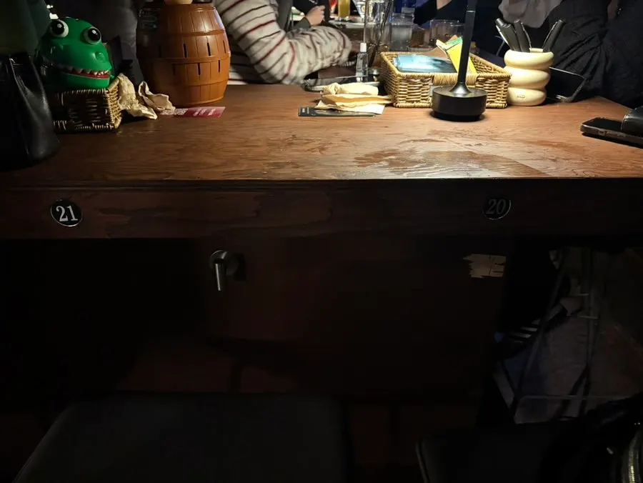 Scene of guests playing games and drinking at Yahwa
