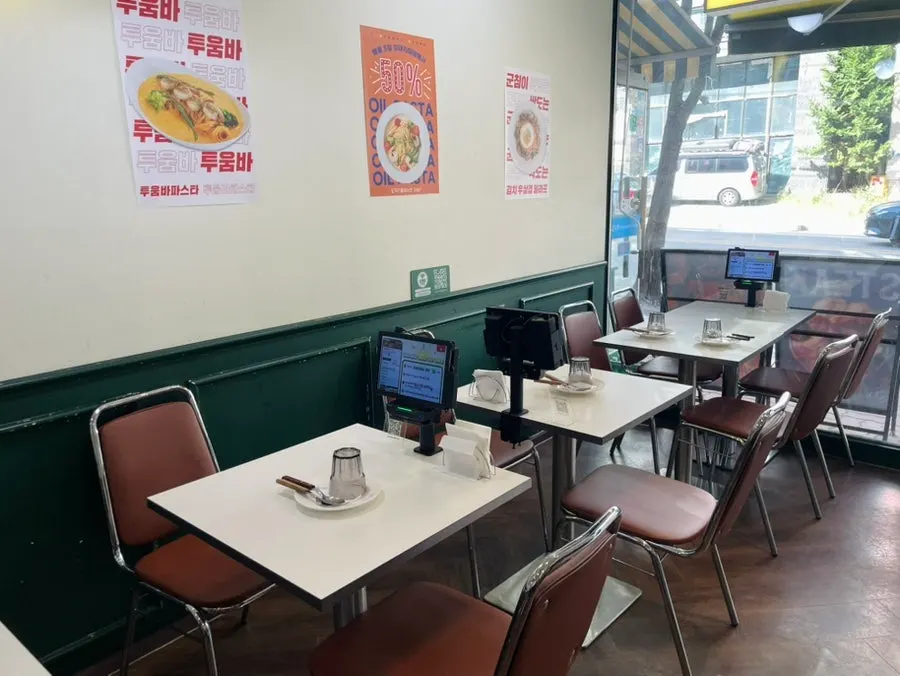 Table with stamp reward program signage