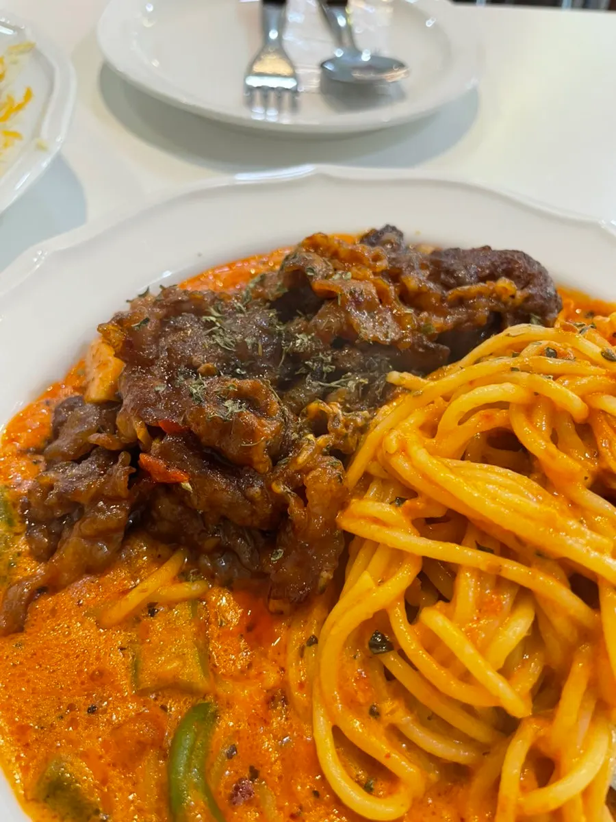 Mala rosé pasta topped with woosamgyeop