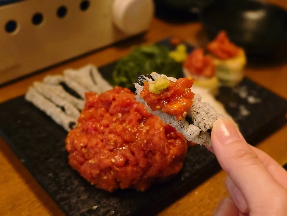 Gochujang yukhoe wrapped in a perilla leaf