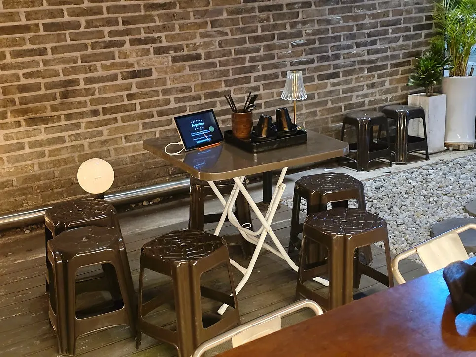 Warmly lit Yeonnam-dong outdoor terrace