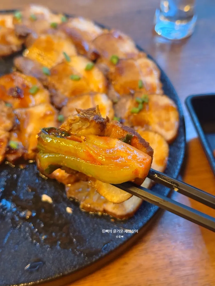 Bok choy served alongside dongpa pork belly