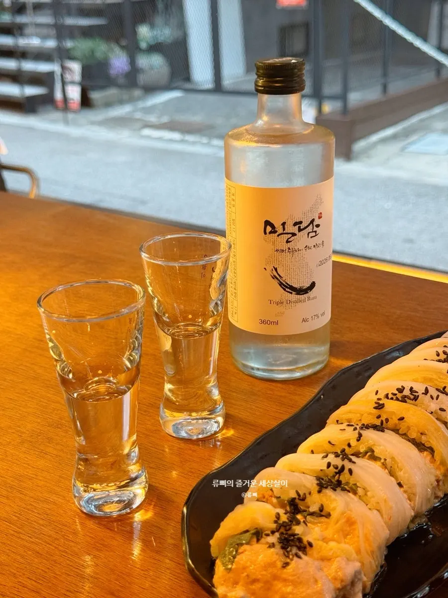 Ijillirya Yeonnam's traditional rice wine menu and a bottle of Mildam