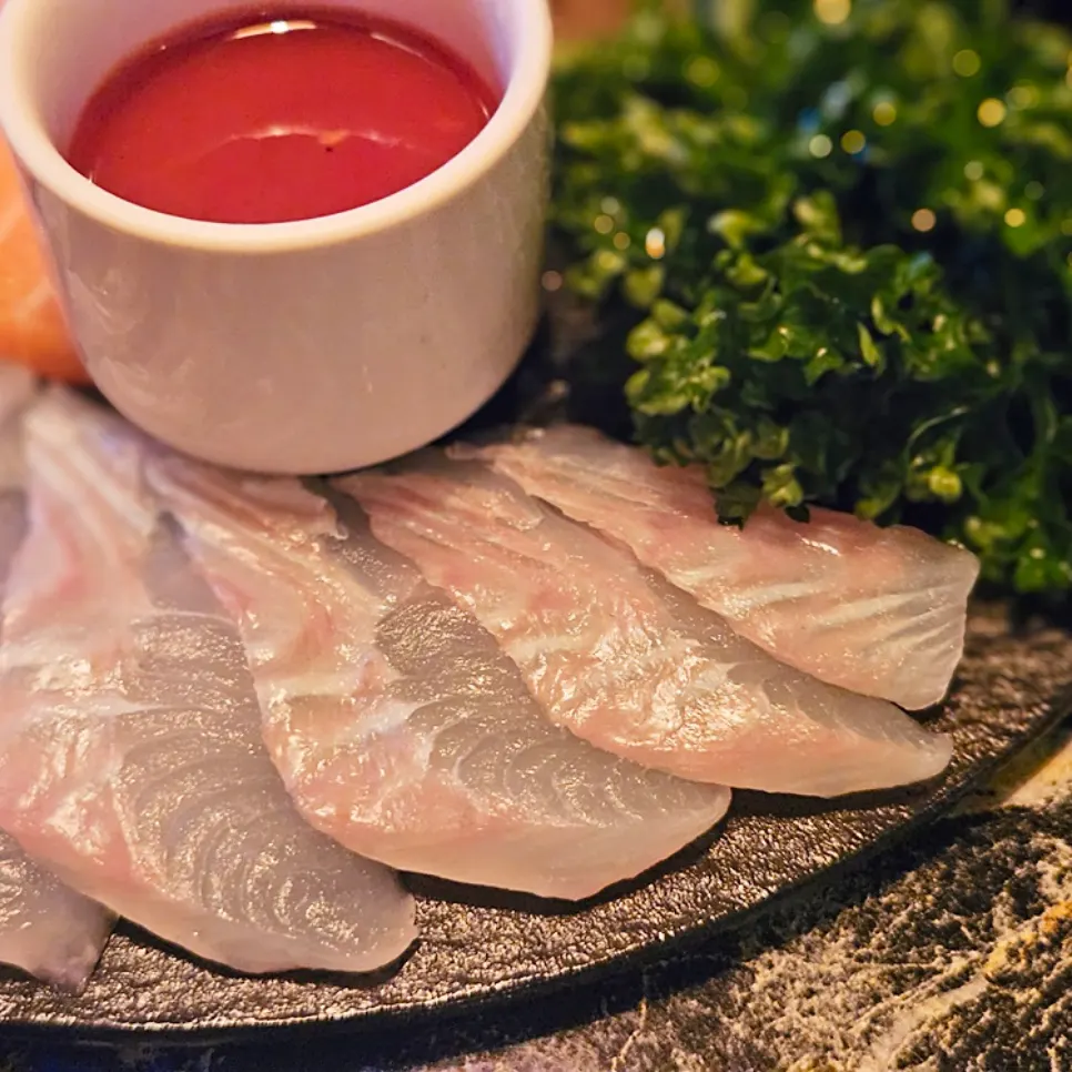 Close-up of bite-sized rolled halibut salt gimbap