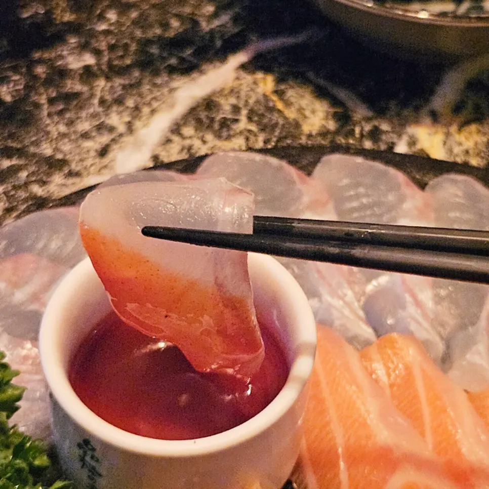 Halibut salt gimbap served with vinegar-chili sauce and aged kimchi