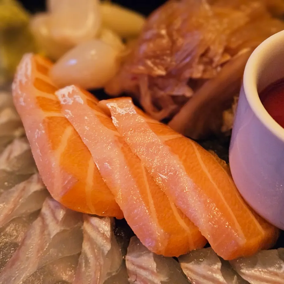 Anju spread and drinks set on the table at Ito