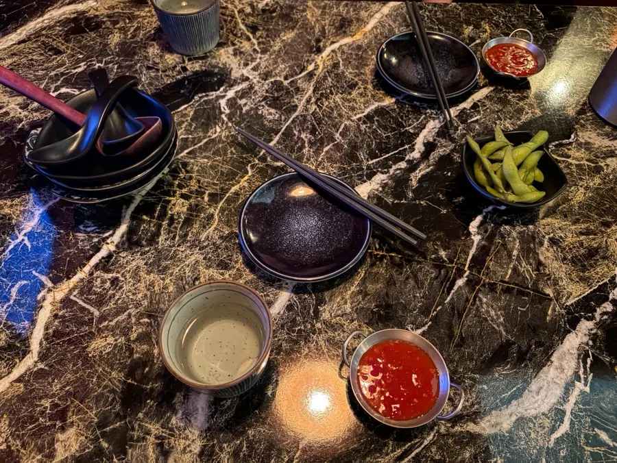 Table with draft beer and basic side dishes