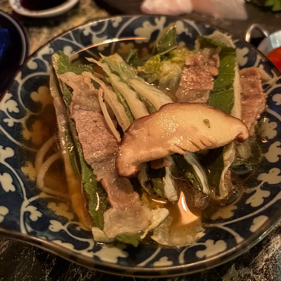 Close-up of meat and cabbage in millefeuille nabe