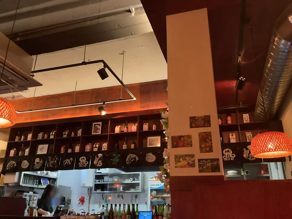 Dimly lit interior of Ito with Japanese ambience