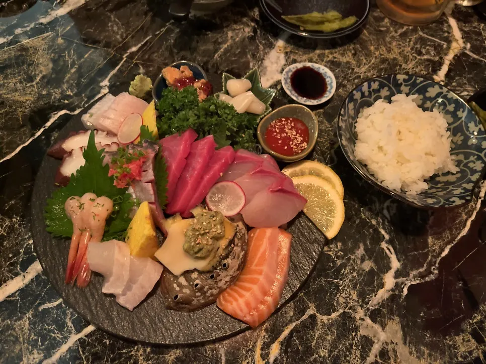 Full plate of assorted sashimi at Ito