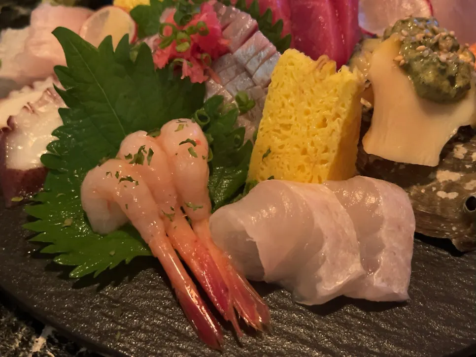 Shrimp meat served with the assorted sashimi