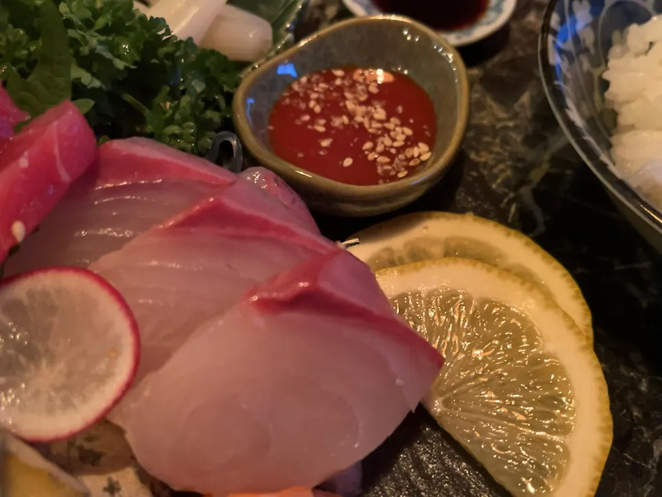 Sashimi served with wasabi and soy sauce