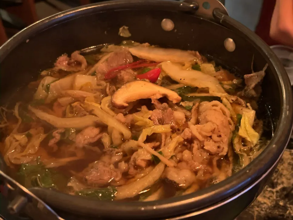 Broth of the mille-feuille nabe with perilla leaf aroma