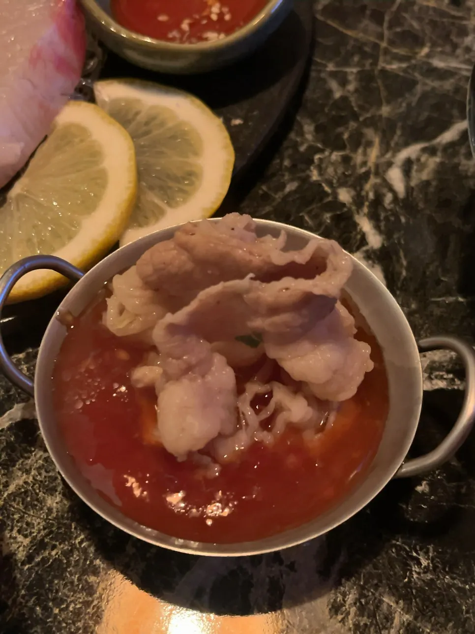 Tender, thinly sliced beef cooked in the mille-feuille nabe