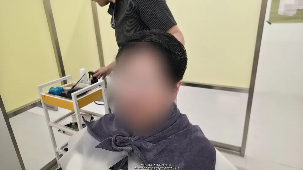 カットとシャンプーを終えパーマ準備をした髪