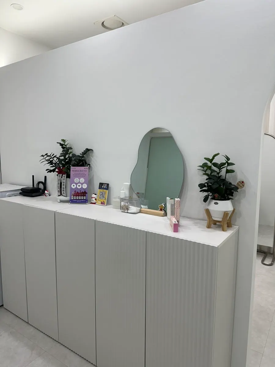 White-toned interior of Iyo Shop's treatment area