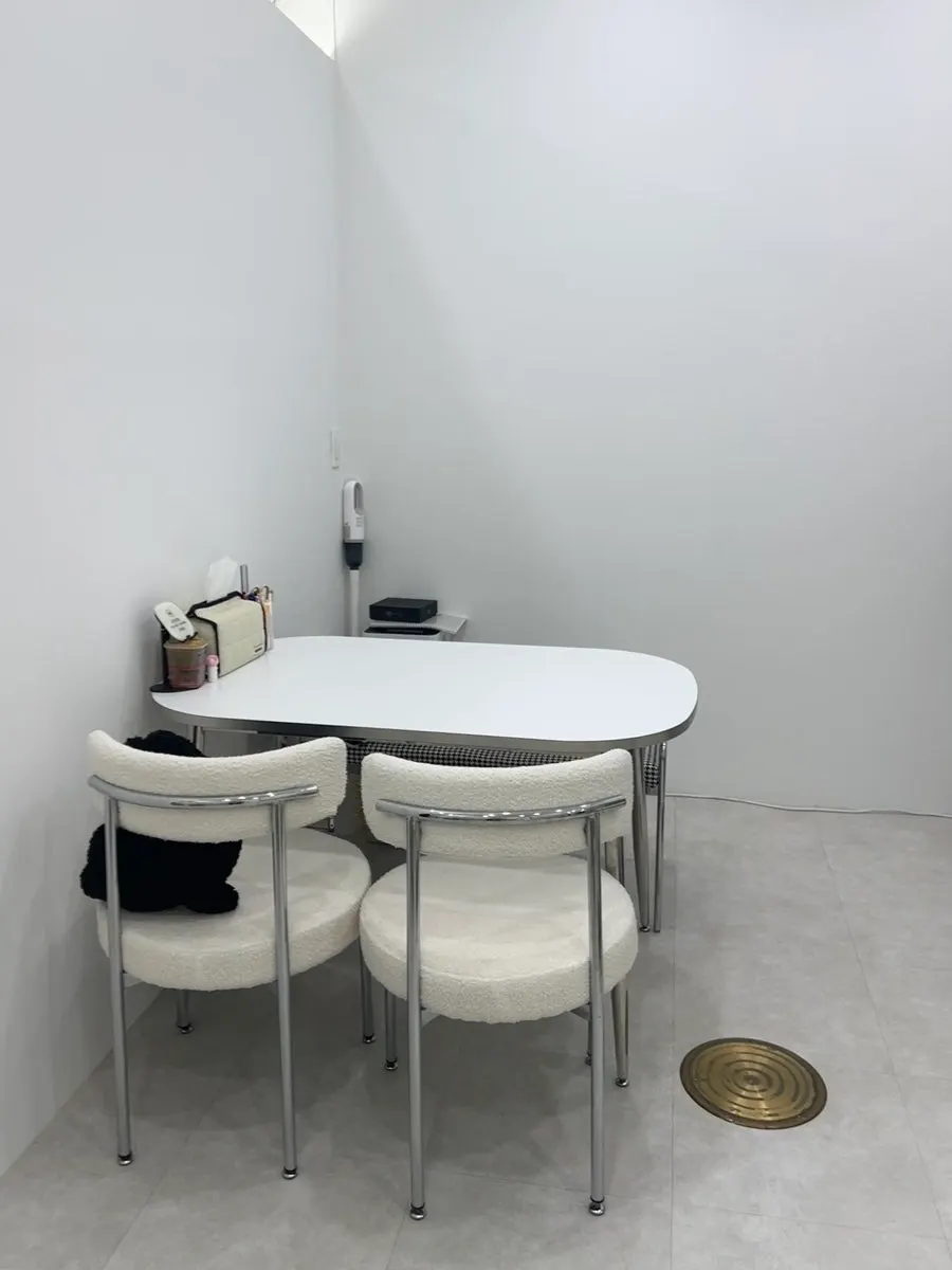 Treatment bed and interior space at Iyo Shop