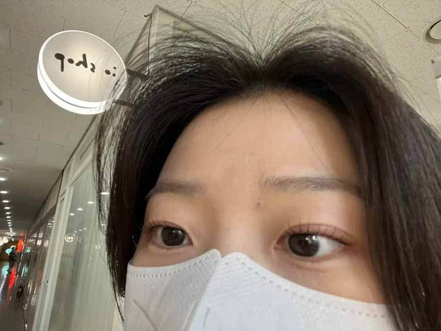 Selfie showing the changed eye look after the lash lift