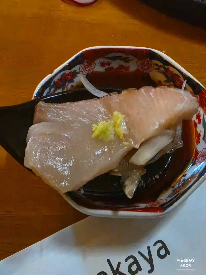 Close-up of red seabream and mackerel sashimi