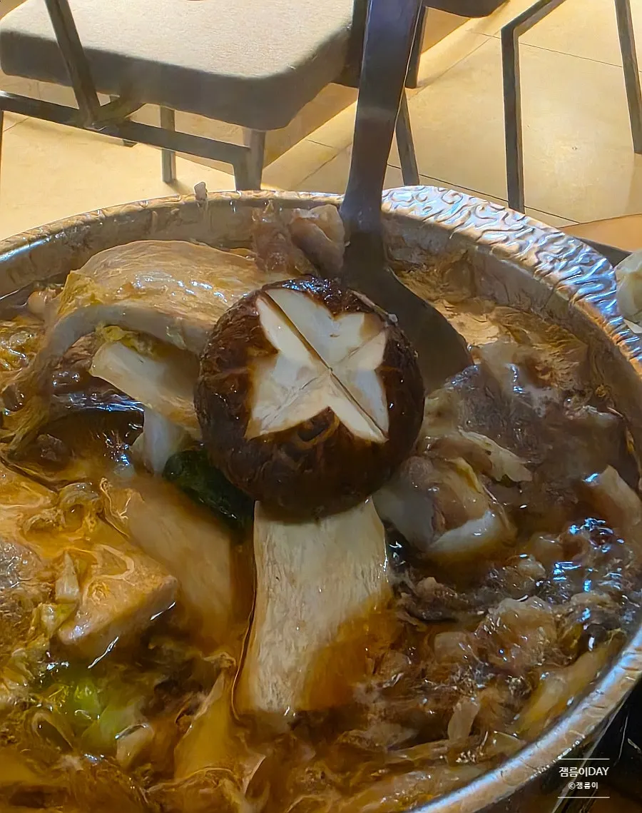 Sukiyaki soy sauce dip topped with an egg yolk
