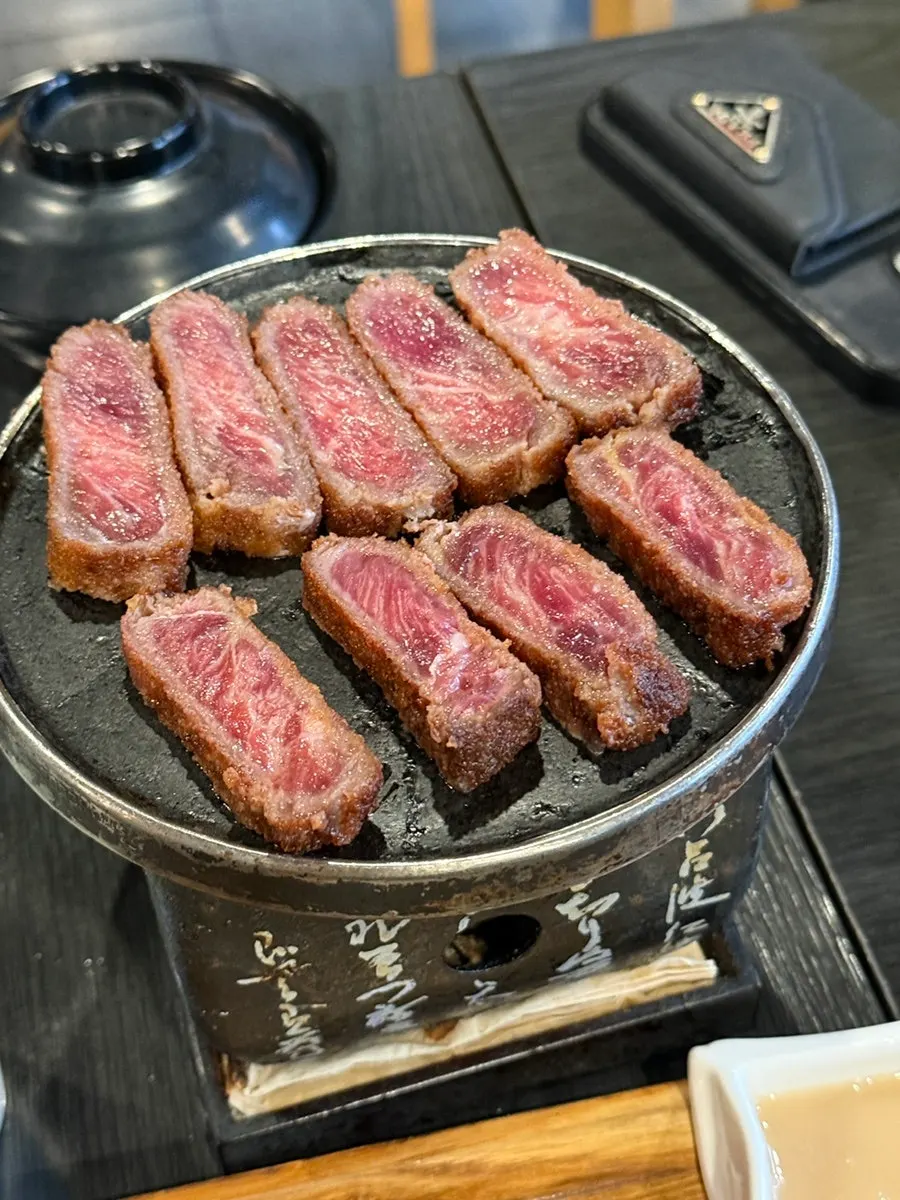 Plate of gyukatsu with a reddish cross-section