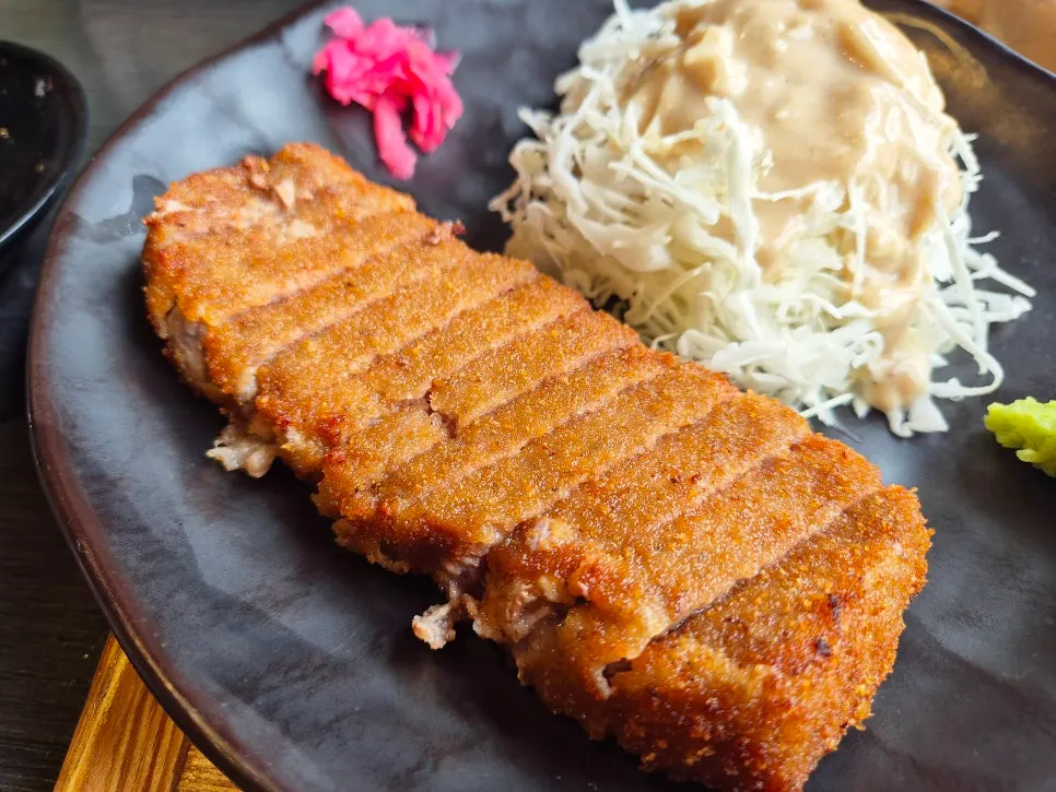 Gyukatsu with cabbage salad, sesame sauce, and bonito soy sauce