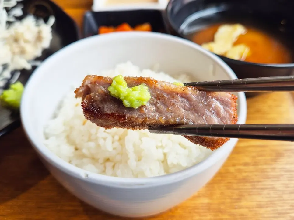 Gyukatsu grilled on the mini brazier topped with wasabi