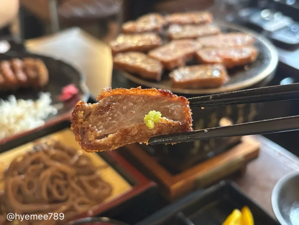 Close-up of a crispy-edged gyukatsu cross-section