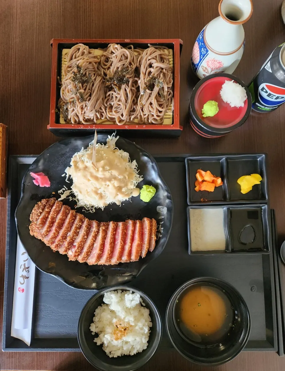 Full table spread of the gyukatsu set and cold soba
