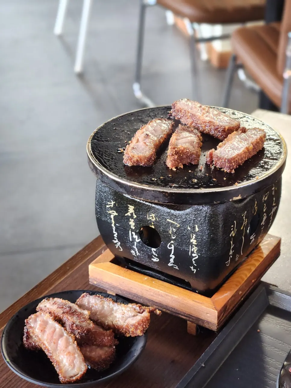 A piece of gyukatsu grilled crisp on the outside
