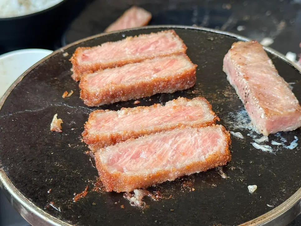 Gyukatsu being grilled on the tabletop fire