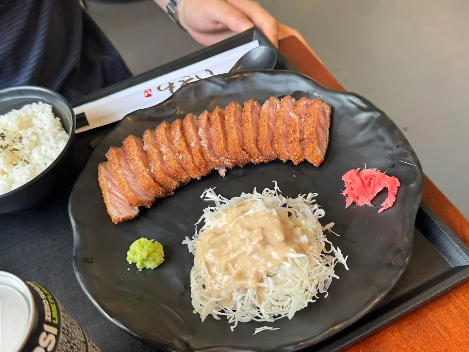 Gyukatsu served with sauce and wasabi