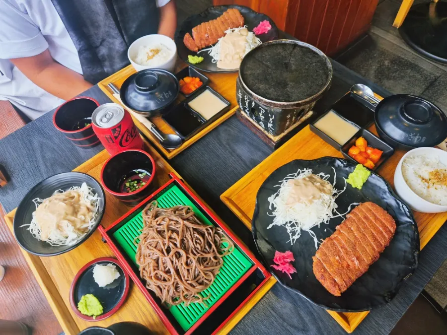Table with two gyukatsu sets and cold soba