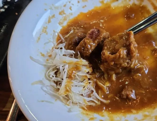 Gyukatsu served in Japanese-style curry sauce