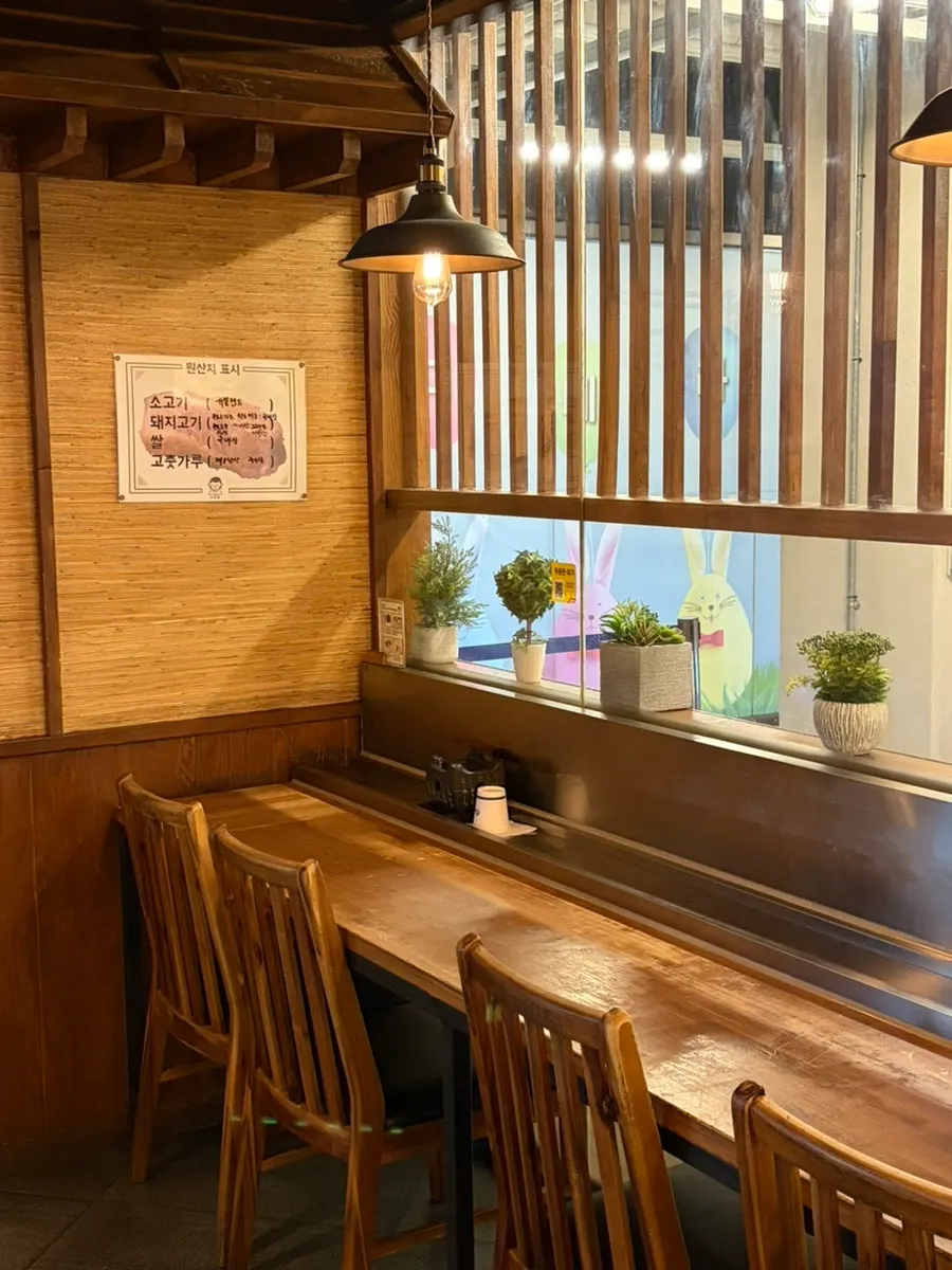 Table seating in the back of the restaurant