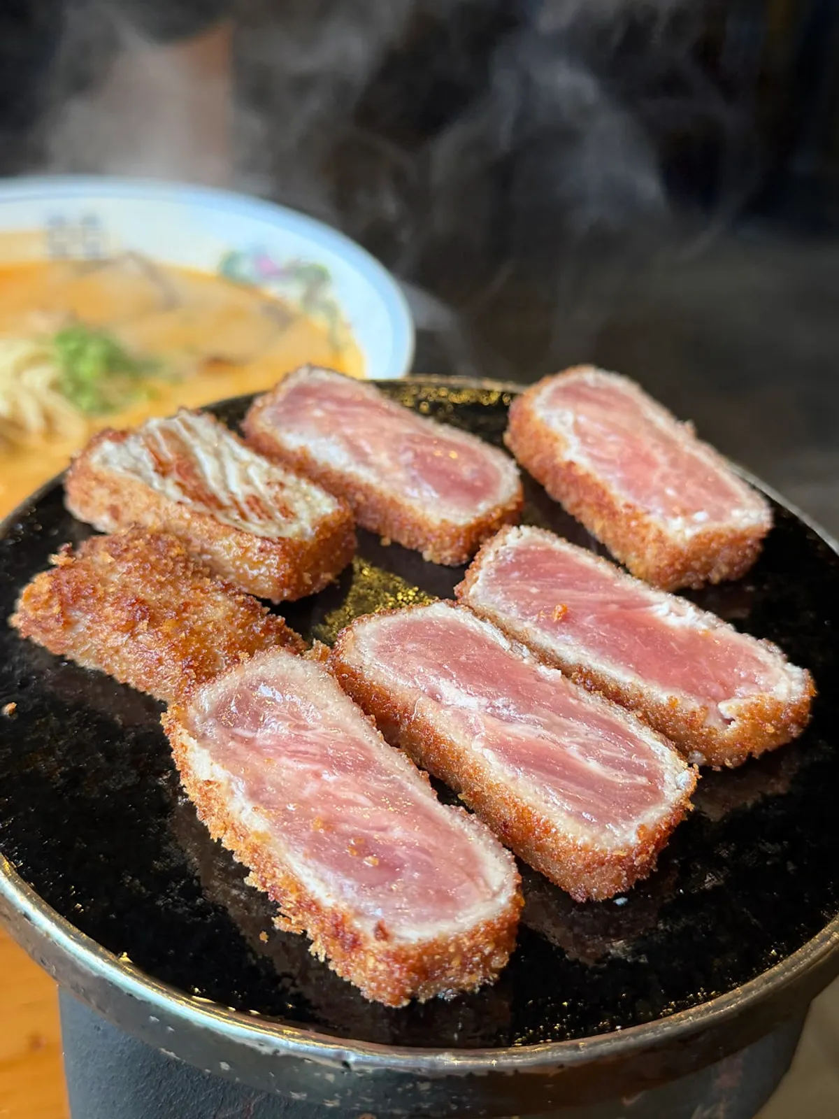 Cross-section of gyukatsu grilled to medium-rare