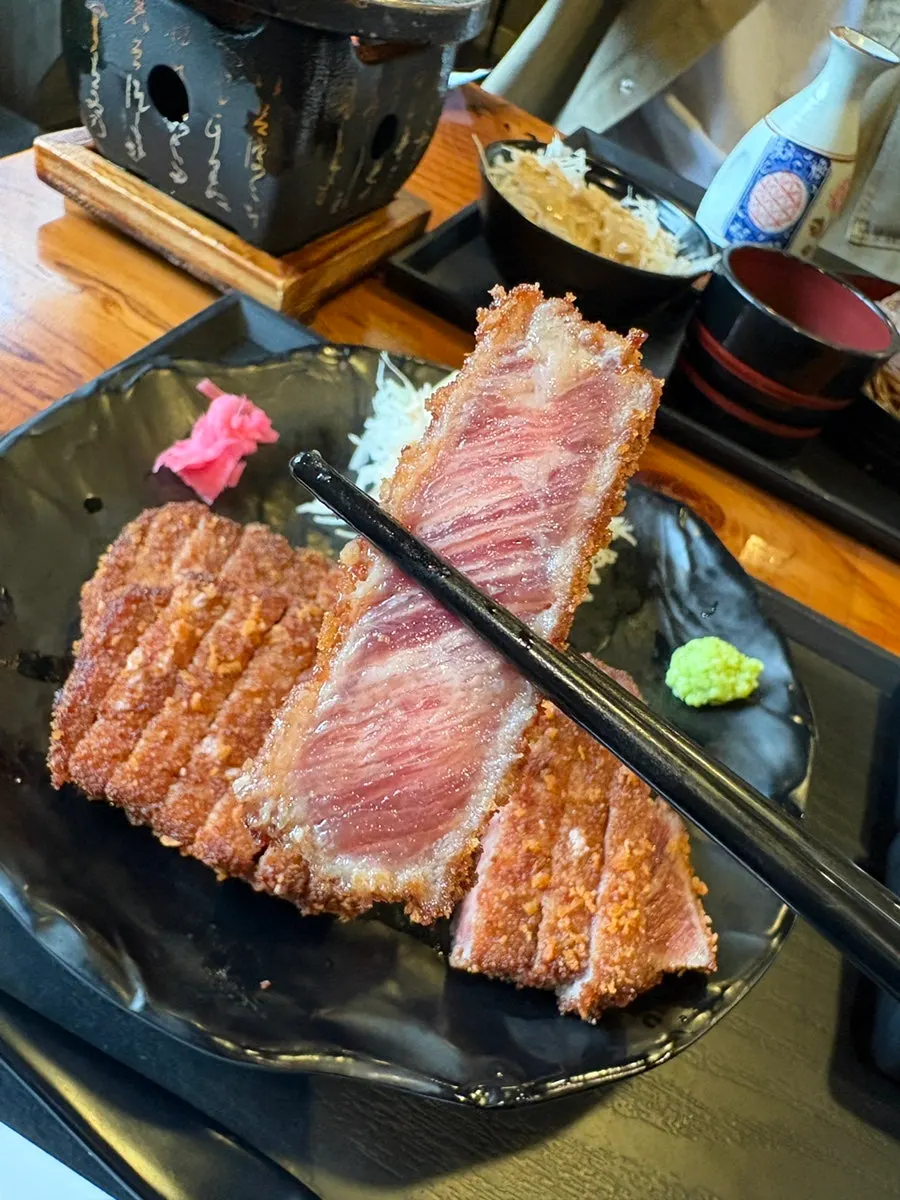 Garlic sauce and soy sauce served with the gyukatsu