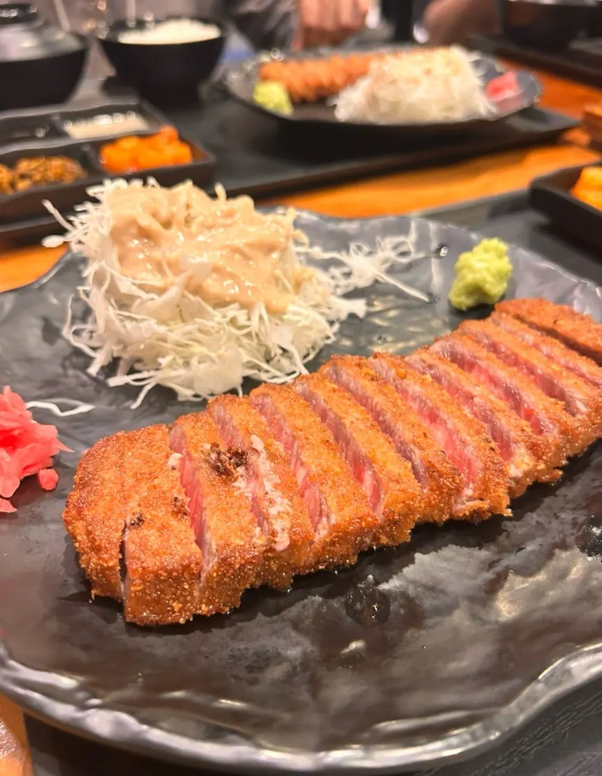Table set with 4 servings of Izawa's gyukatsu set