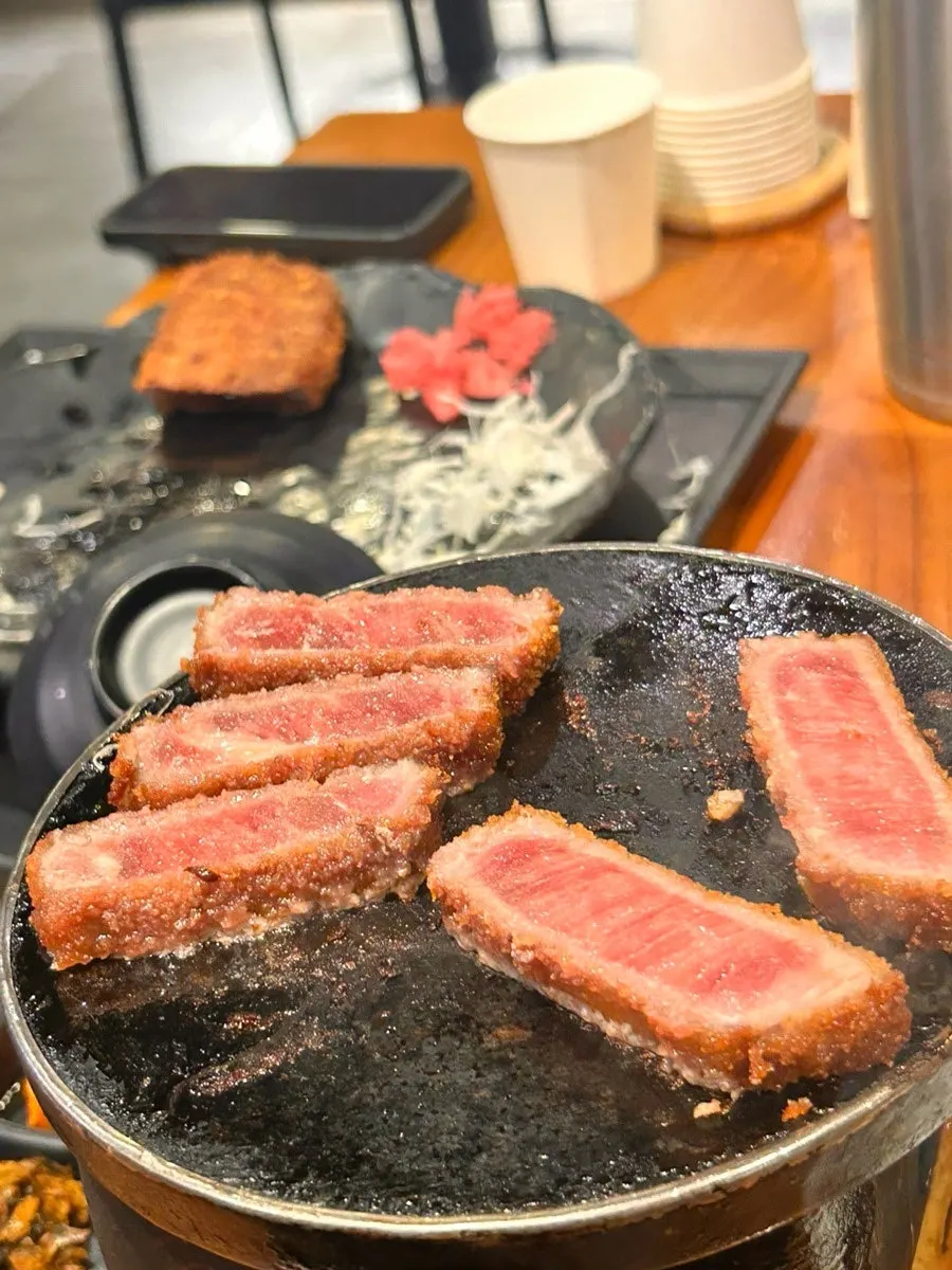 Izawa grill plate packed full of gyukatsu pieces
